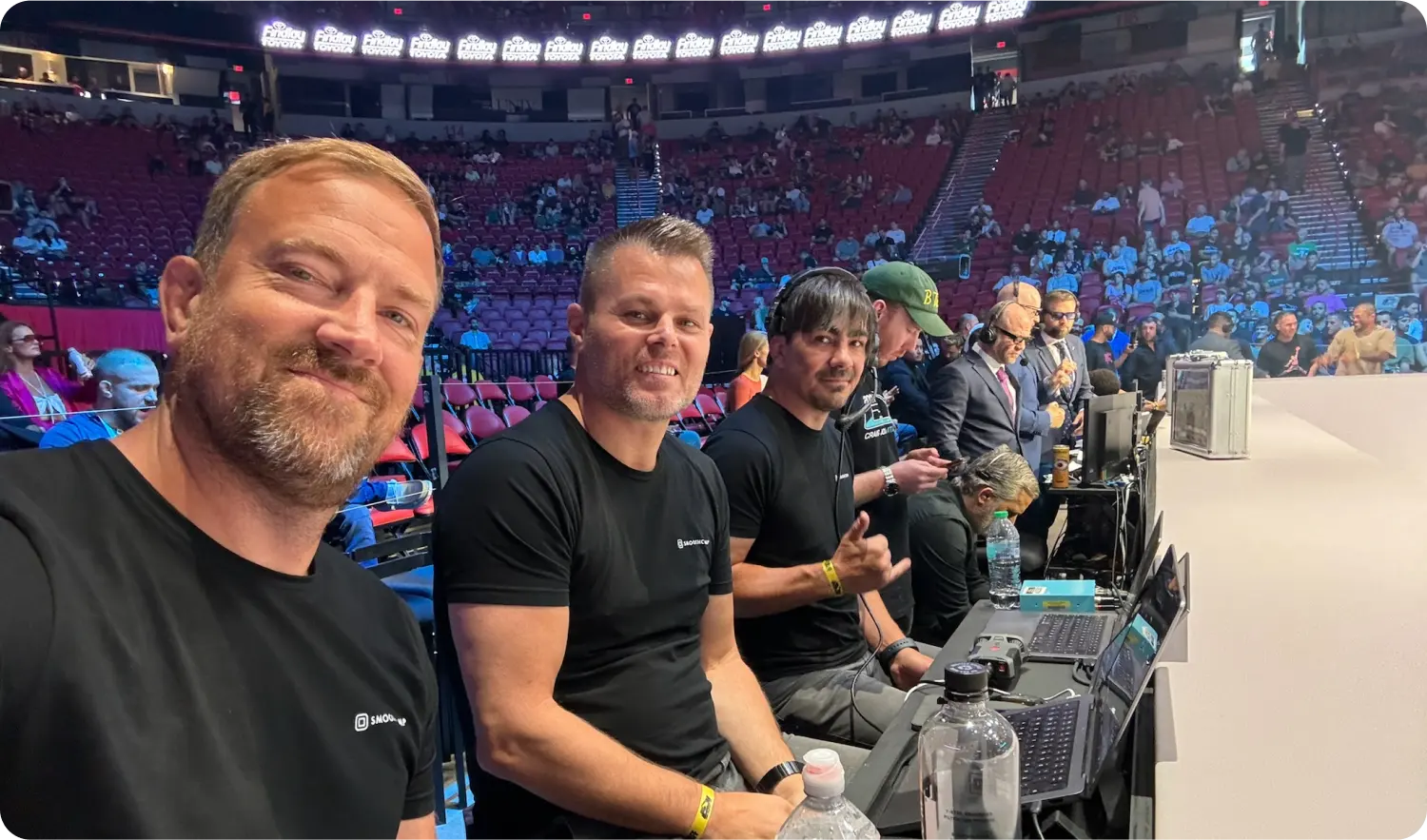 The Smoothcomp team taking a selfie in a competition arena