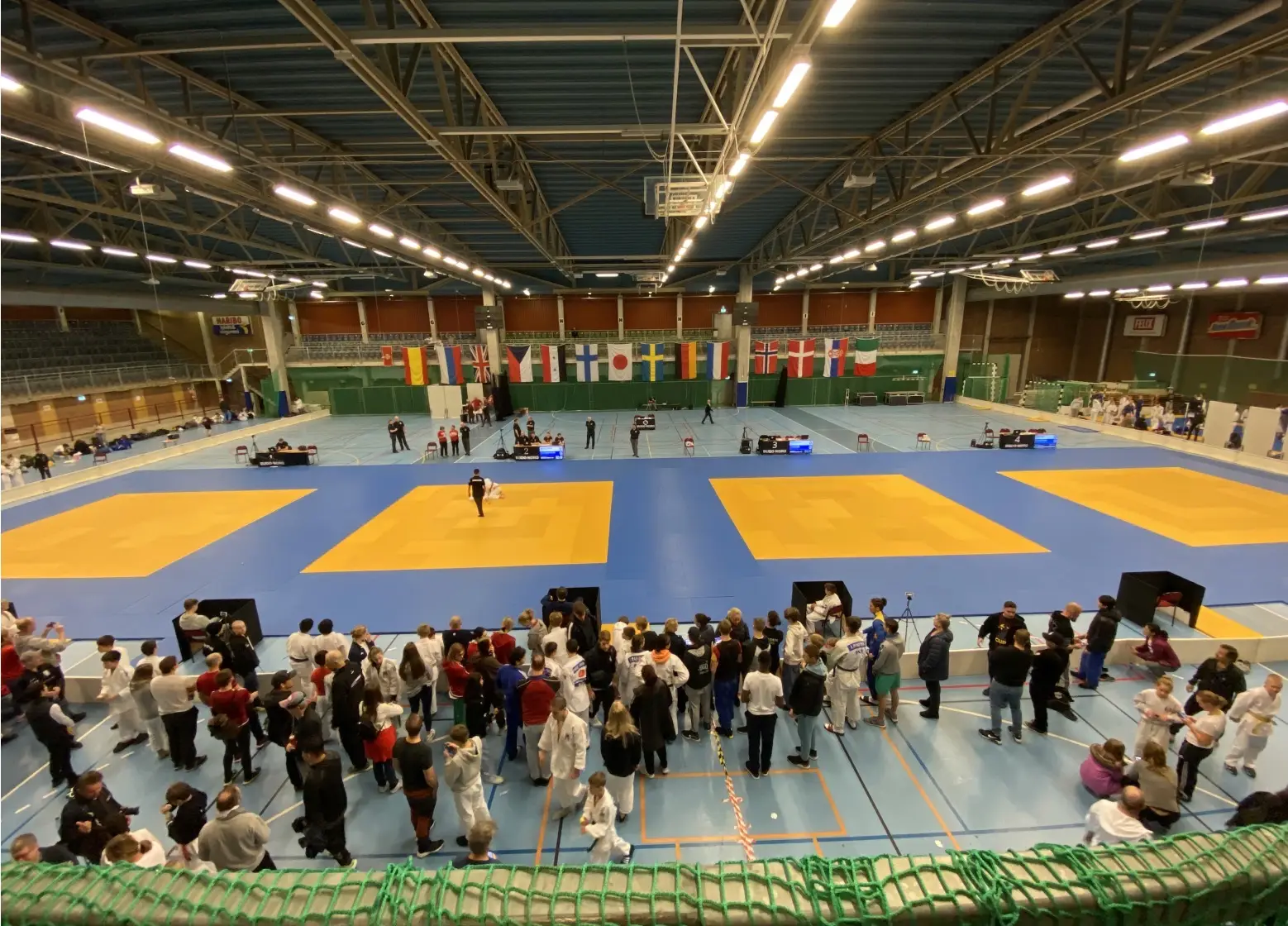 Swedish judo championship hall with yellow and blue tatami